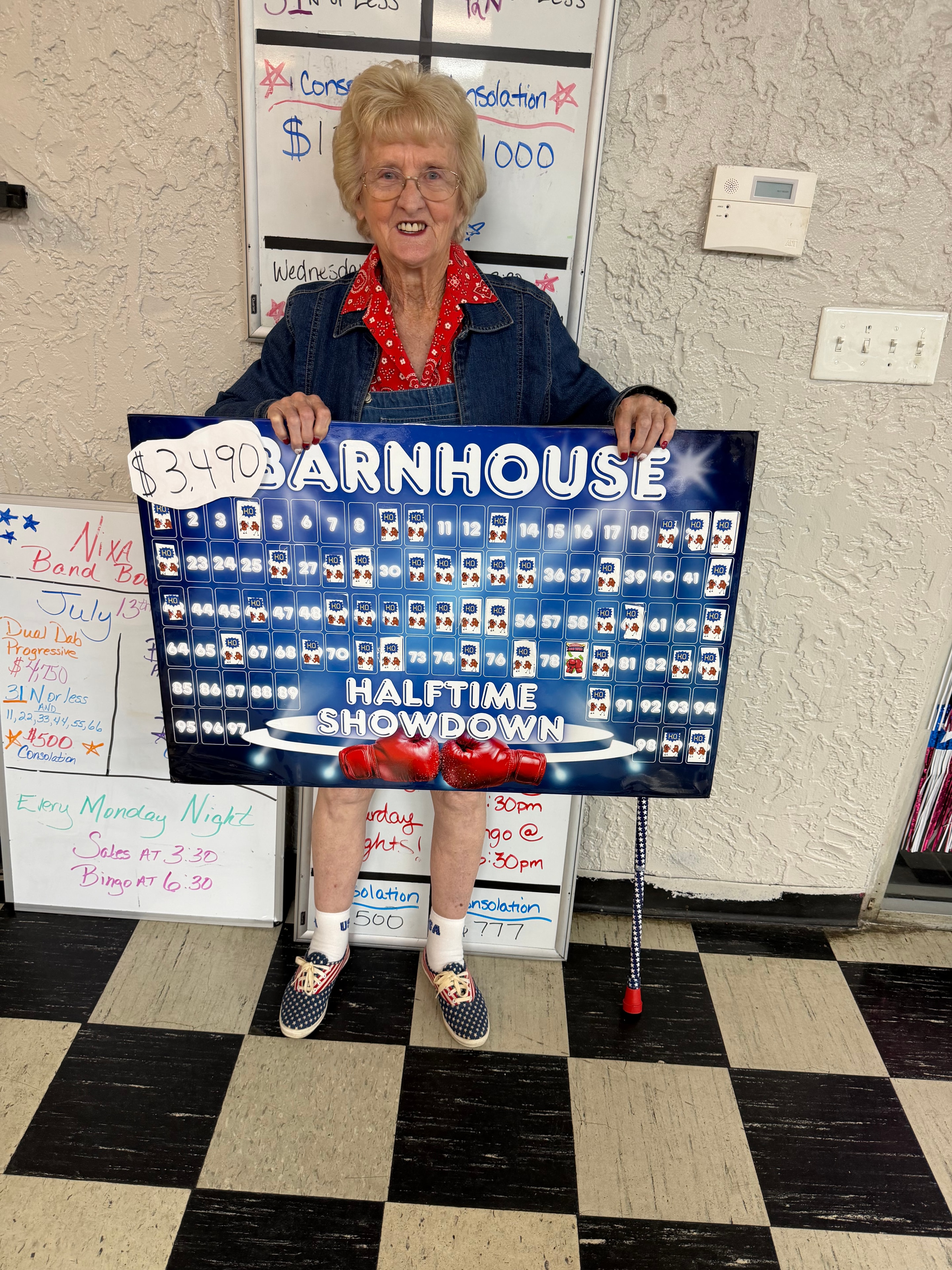 Winner holding Barnhouse Halftime Showdown board